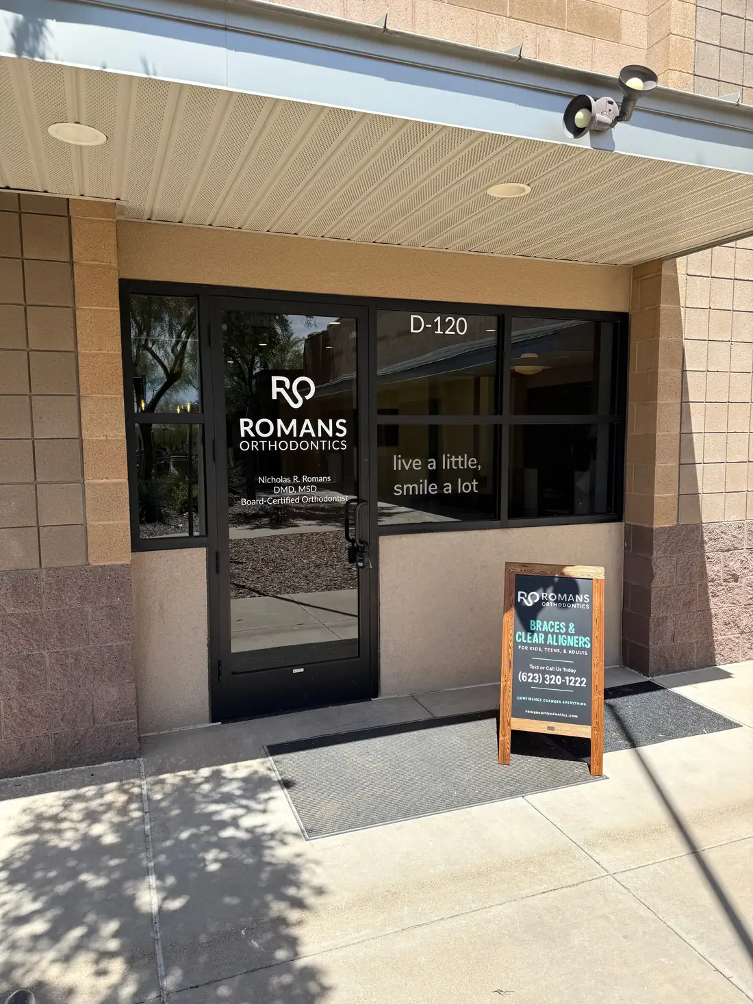 The entrance to Romans Orthodontics at Suite D-120 in Anthem, Arizona