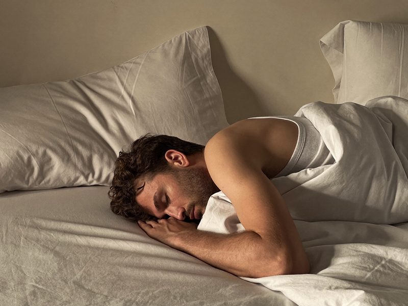 An adult sleeping, representing airway and sleep appliance care